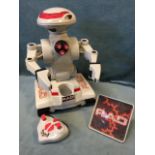 A 1980s RAD toy robot with rechargeable 6V battery pack and remote control, the machine on