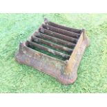 A square Victorian cast iron bootscraper with grill in lozenge moulded frame, having rounded