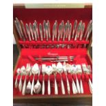 A walnut cased 1960s canteen of silver plated cutlery, twelve settings in the Community pattern by