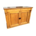 A Victorian pine dresser base with rectangular moulded top above two frieze drawers, having panelled