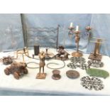 Miscellaneous metalware including a wine rack, a wrought iron candelabra, mug stands, a model canon,