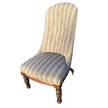 A William IV mahogany button upholstered spade-back chair, with sprung seat raised on leaf carved