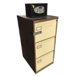 A three-drawer Vickers Trimline filing cabinet, mounted with a Yale combination homesafe -