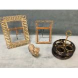 Two Edwardian brass interlaced ring photo frames; an oval nineteenth century toleware egg stand with