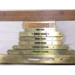 Seven brass mounted hardwood levels all with intact glass tubes - several by C Preston & Sons of