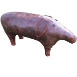 A Liberty cowhide leather pig with thick snout, button type eyes, flap ears and shaving filled body,