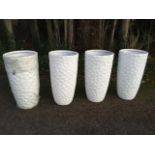 A set of four tall tapering resin garden pots with hexagonal honeycomb type mesh finish. (30in) (4)