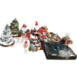 A quantity of Christmas decorations including lights, ornaments, singing Santas, baubles, snowmen,