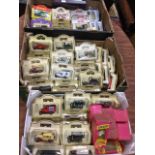 A collection of 59 boxed Days Gone diecast vintage trucks; and other boxed vehicles including 5