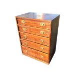 A mid-century rosewood dwarf chest with five graduated drawers mounted with brass military style