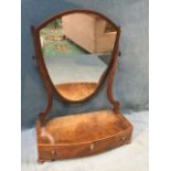 A nineteenth century mahogany dressing table mirror inlaid with boxwood stringing, the shield shaped