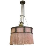 An Edwardian rise-and-fall hanging light with weight suspended by three cables from ceiling pulleys,