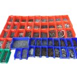 A large quantity of screws, nails, nuts, bolts, pins, tacks, wall-plugs, cable clips, etc.,