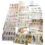 Eight full sets of cigarette cards: Ogdens - modern railways 1936; Players - past & present 1916 and
