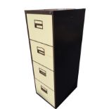 A four drawer metal filing cabinet, complete with a quantity of suspension files. (18.25in x 24.