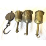 Three Victorian brass clockwork spit roasters by Salters, the hanging movements in tubular cases