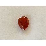 A fire opal single loose gemstone, the pear cut jewel of approx. 0.2 carats - boxed.
