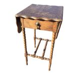 A small oak drop-leaf occasional table, with scalloped moulded top above a frieze with drawer,