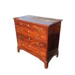 A Georgian mahogany chest of drawers with rectangular moulded top above four oak lined cockbeaded
