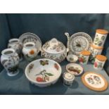 A collection of Portmeirion pottery including vases, storage jars & covers, a clock, a large cooking