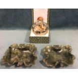 A pair of nineteenth century carved soapstone jade type dishes in the form of leaves with curled