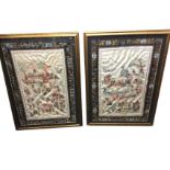 Chinese silk embroideries, a pair, figural panels with children, with applied floral borders, in