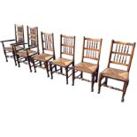 A set of six nineteenth century country oak spindleback dining chairs, the backs with gallery