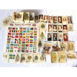 A collection of miscellaneous cigarette cards - Wills, Players, some silks, etc; and a set of
