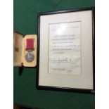 A cased British Empire Medal awarded to George Currie of Edinburgh, together with framed bestovial
