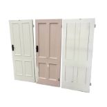 A set of three painted Edwardian four panel doors. (31.75in x 79.5in) (3)