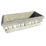 A rectangular composition stone garden trough with moulded bobbin frieze. (36in x 17in x 11in)
