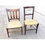 A nineteenth century oak church-type chair with platform back rail on chamfered columns above a rush