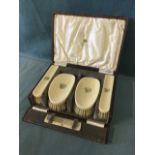 A leather cased set of ivory handled gentlemans brushes, complete with comb, by Edward of Glasgow