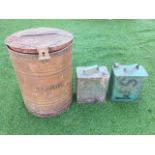 A tubular metal flour bin with hinged lid; and a pair of Esso fuel cans with oval embossed sides and