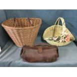 A Victorian leather gladstone bag with brass mounts; a cane bicycle hamper with two leather