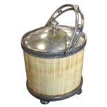 An oval nineteenth century silver plated tusk tea caddy, the box on bun feet decorated with ribbed