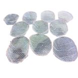 A set ten oval galvanised mesh baskets on metal frames. (21in) (10)