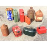 Ten miscellaneous fuel cans - jerry type, 20 & 10 litres, rusty, Esso, plastic gallon type, marine