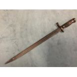 A WWI bayonet, the P13 style weapon with grooved hardwood handle metal pommel and guard, the 15.75in