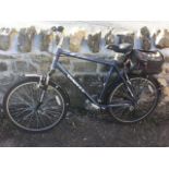 A Dawes mountain bicycle - Saratoga, with Shimano gears, a Trek pannier, soft padded seat, aluminium