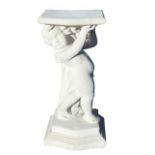 A composition stone stand with platform supported by a draped cherub, raised on shaped moulded