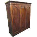 A Victorian mahogany Wylie & Lochead combination wardrobe, the central panelled door enclosing