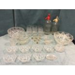 Miscellaneous glass including two soda siphons, a jelly mould, a set of seven dessert bowls, cut