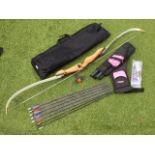 A Samick Polaris archery starter bow, the maple riser paired with recurve limbs, with quiver and