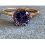 A 9k gold and tanzanite solitaire ring, the brilliant cut claw set stone of approx. 1.2 carats,
