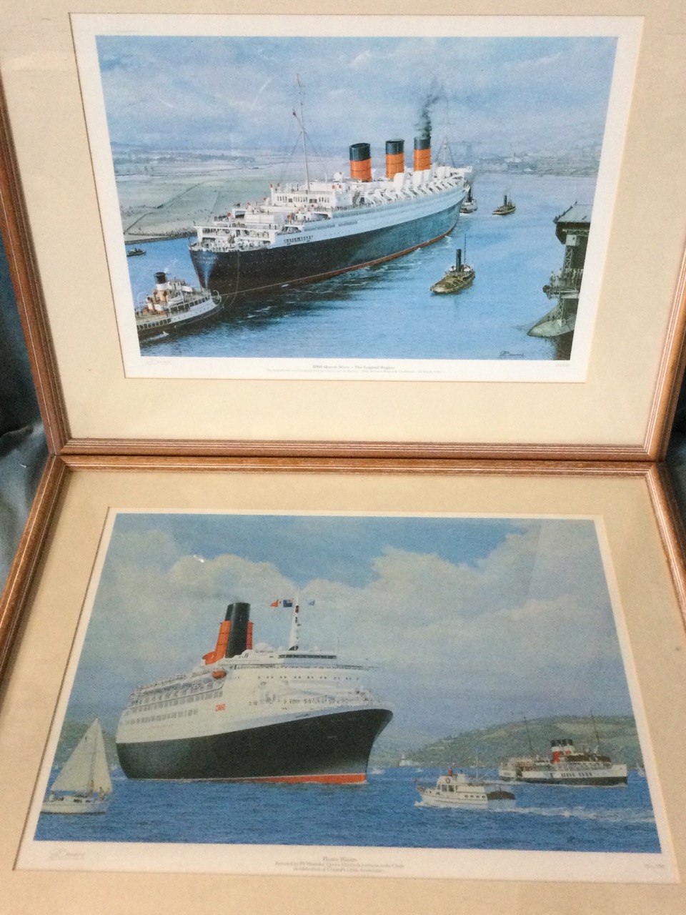 Gordon Bauwens, a pair of lithographic prints of the Queen Mary and the Queen Elizabeth 2 on the
