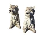 A pair of composition stone scottie dogs with painted eyes & noses. (13.75in) (2)