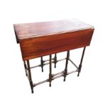 A Victorian mahogany spider-leg pembroke table, the top with two rule-jointed drop leaves on