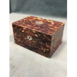 A faux tortoiseshell tea caddy, the box with diamond shaped silver type escutcheons, having interior