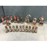 A set of seven Men of Valour soldier figurines; three heavy cast Scottish figures; and a set of